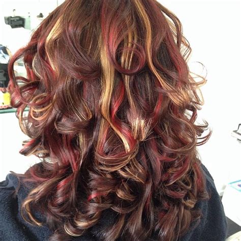 dark brown hair with caramel and red highlights